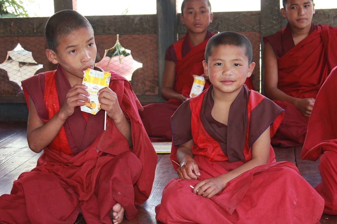 Young monks at Chorten Kora, Tashi Yangtse, Bhutan